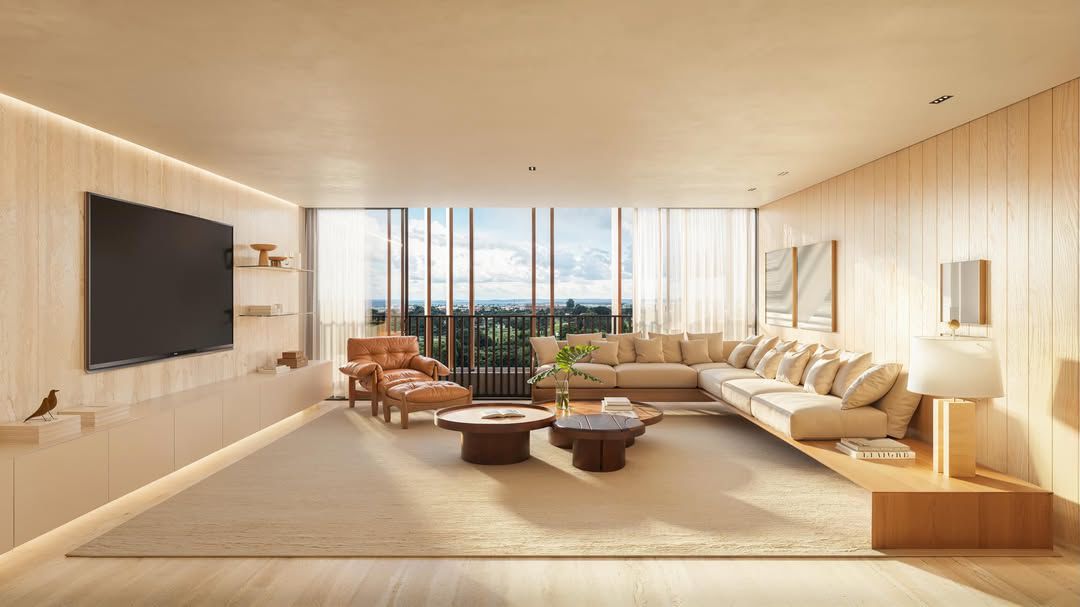 Living amplo com luz natural e vista do Icon Brasília